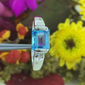 Emerald Cut Blue Topaz Ladies Sterling Silver Ring